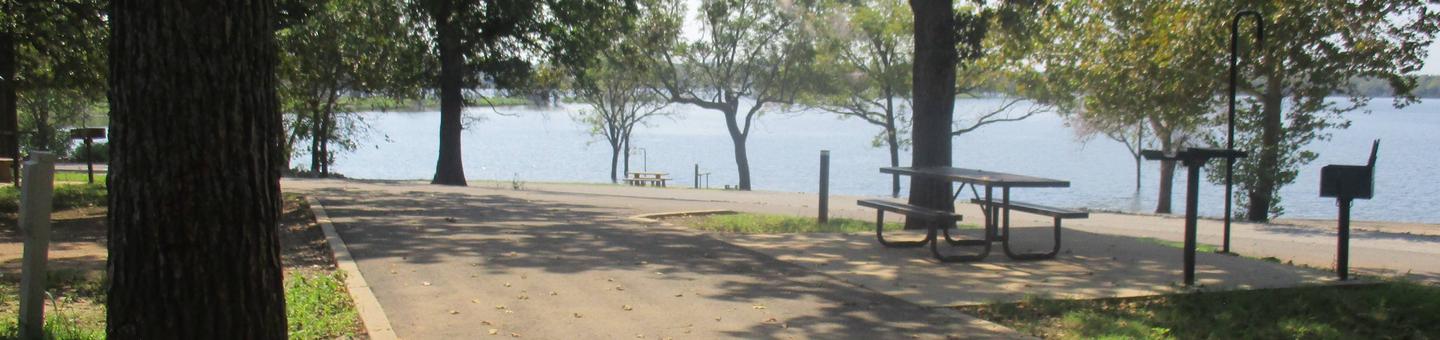 Site 22 - Flat RockSite 22 offers a nice lake view and easy access to the boat ramp.