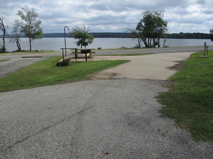 Site 2B - Rocky PointSite 2B is a pull through campsite that offers a secondary asphalt pad for additional parking.