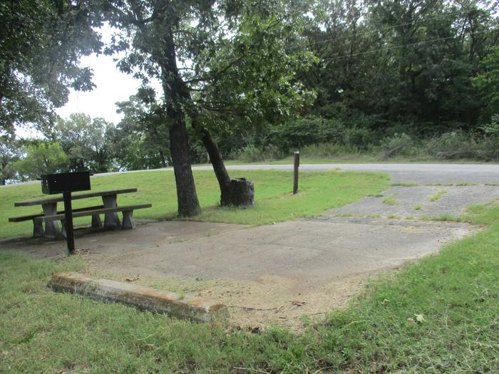 Site 15 - Rocky PointSite 15 offers a concrete parking surface with an asphalt drive.