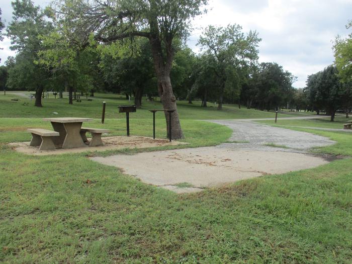 Site 23 - Rocky PointSite 23 offers a concrete parking pad with asphalt drive.