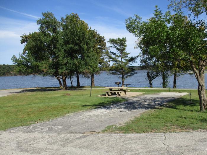 Site 59 - Rocky PointSite 59 offers a great lake view and easy access to the swim beach and boat ramp area.