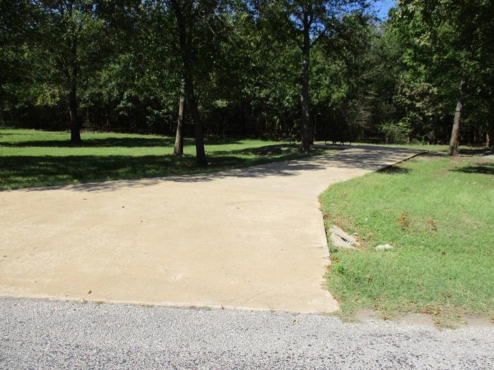 Site 38 drive - Blue BillSite 38 offers a long concrete drive with partial shade.