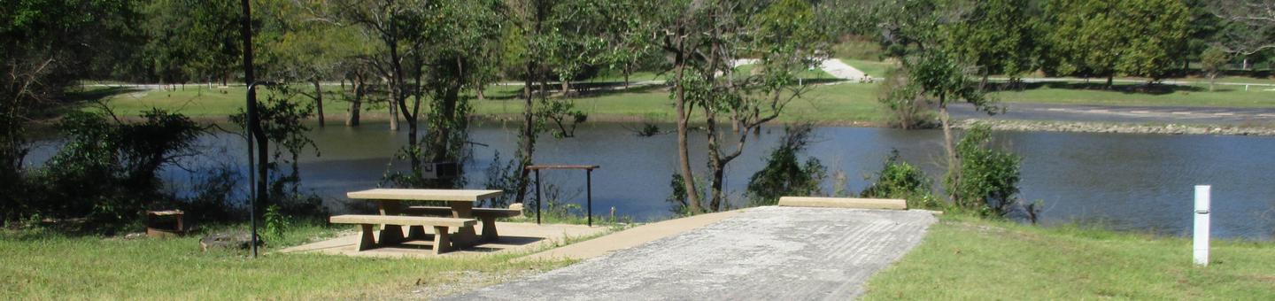 Site 28 - Rocky PointSite 28 offers an asphalt drive with easy access to the water.