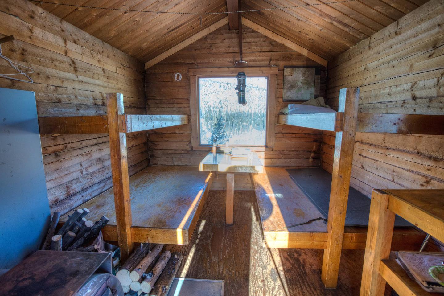 Inside of log cabin Caribou Bluff Cabin interior