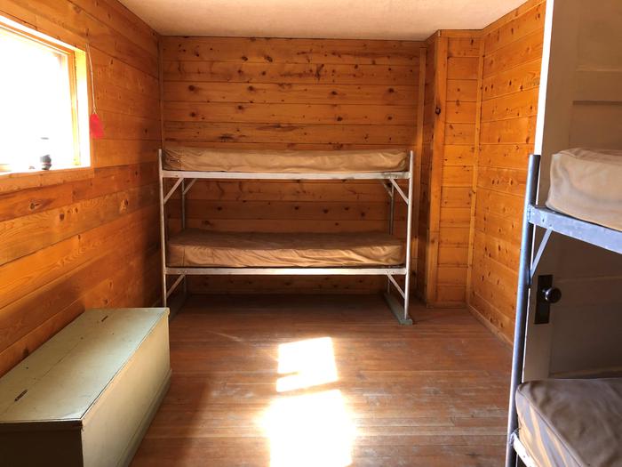 Bunkbeds and wooden storage boxBedroom