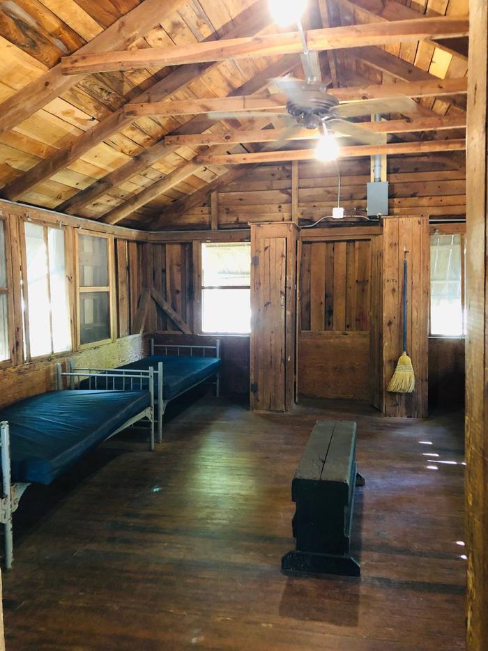 Inside of historic 6 person cabin.