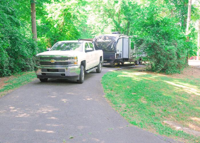 Pull-thru exit, driveway slope, utilities-side clearance.Victoria Campground, campsite 69.