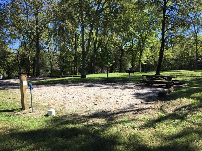 WILLOW GROVE CAMPGROUND SITE #4 CORNER VIEWWILLOW GROVE CAMPGROUND SITE #4 WHITE CAP IS WATER VALVE, NOT SEWER