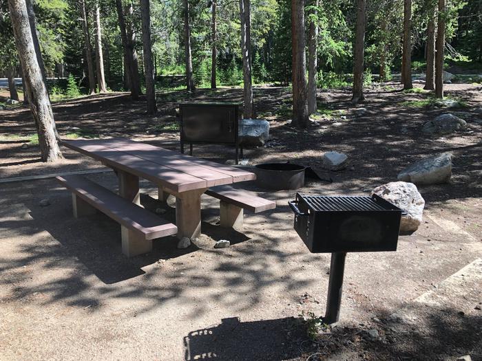 view of picnic table and bbqview of picnic table