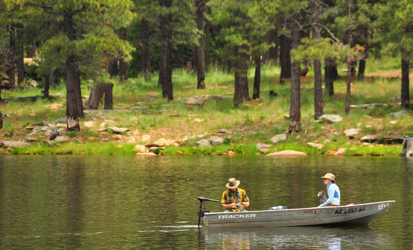 Fishermen in boat on Woods Canyon LakeWoods Canyon Lake is one of the most popular fishing lakes in Arizona. Built by Arizona Game and Fish in 1958, this lake is stocked weekly during the summer with catchable sized trout.  
