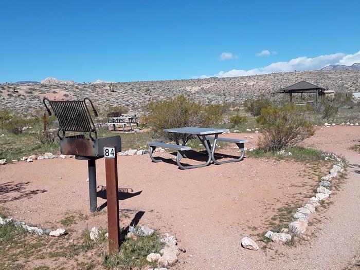 Site 84 walk-to with parking 100 ft No Shade Structure or Fire pitTent site with a bbq grill and a picnic table
hike in from parking lot number 84, 
No shade structure or fire pit