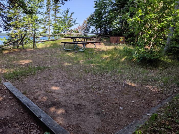 Stockton site 3 with picnic table, bear box, tent pad, and lake viewStockton site 3