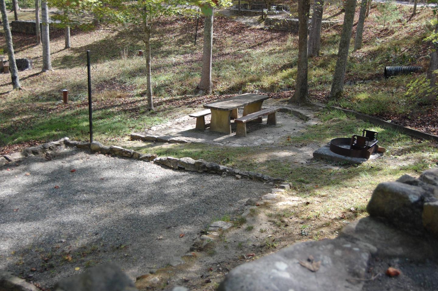 19 located in the interior of the campground loop, this site is nice and open and lays below the paved parking area. It is accessible with stone stairs. 