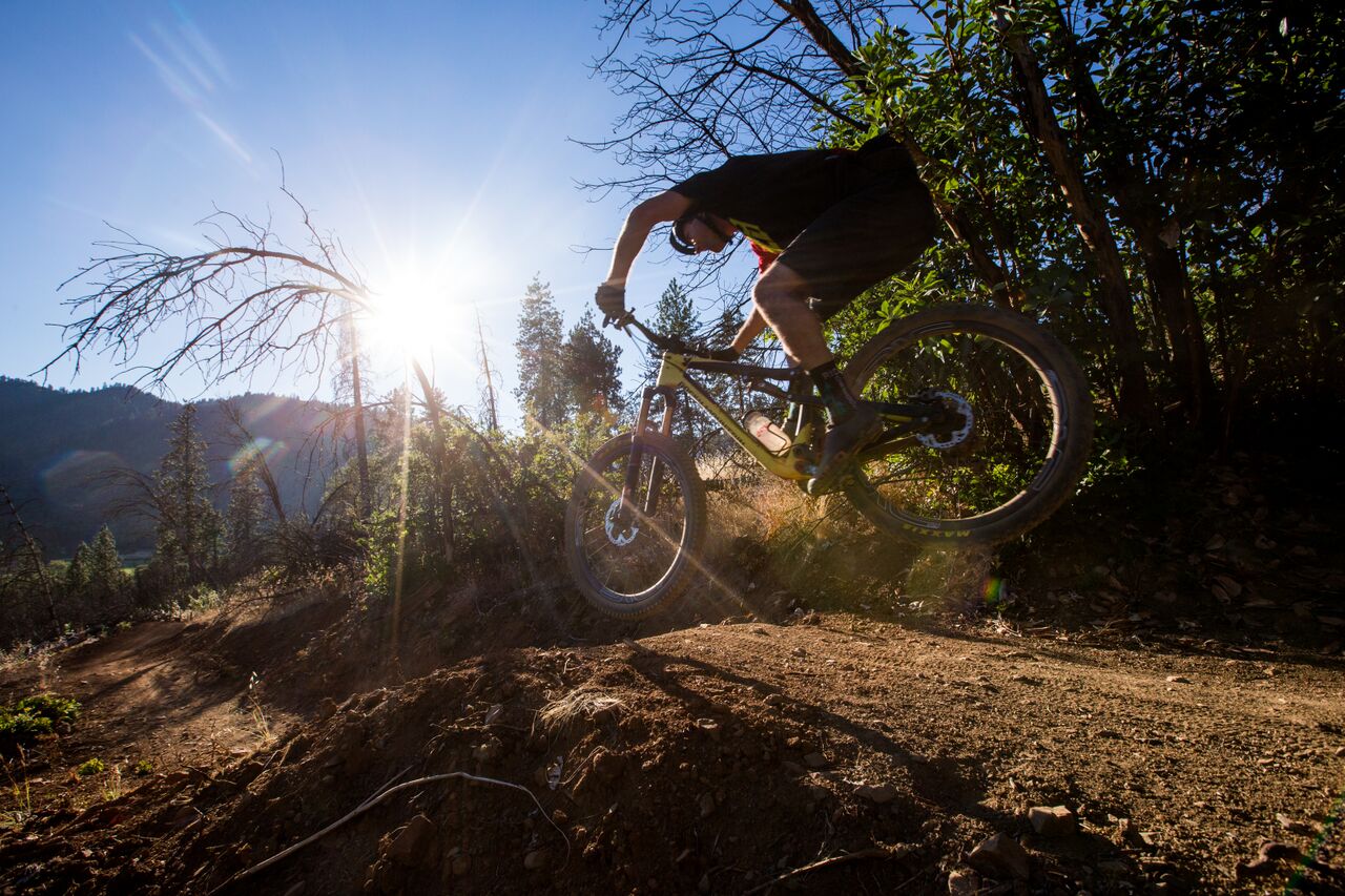 Catching air at the Mountain of the Rogue Trail System 