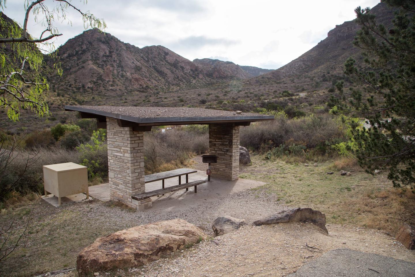 Chisos Basin Campsite #17 shade ramadaShowing bear box, picnic table, and grill