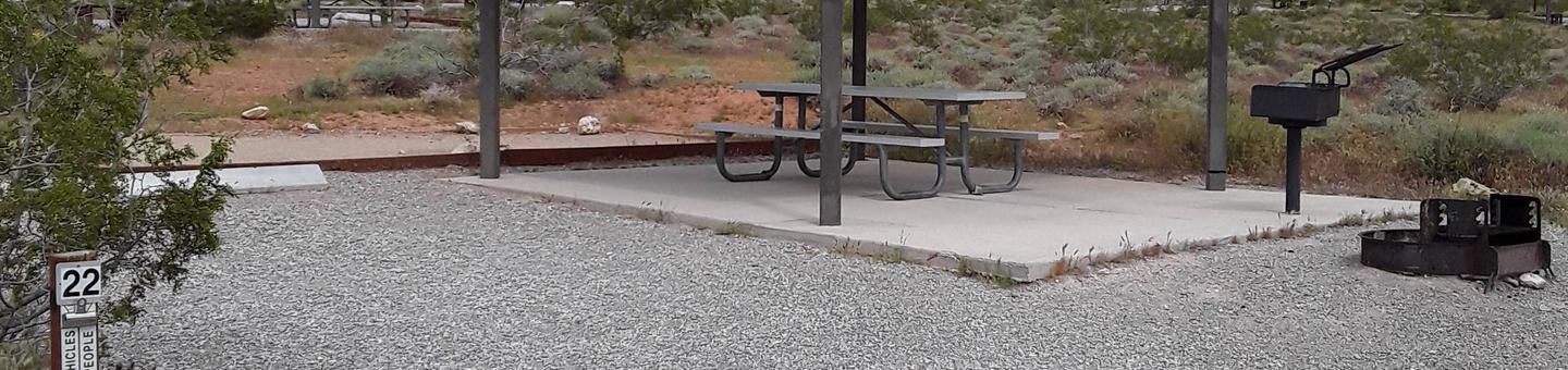 Red Rock Standard site 22this standard site has a nice shelter with a picnic table and a cement slab. A large tent pad that can hold many tents and it has a nice fire pit with a sitting area around it. plenty parking for the two vehicles allowed per reservation or a Recreational vehicle and a small vehicle