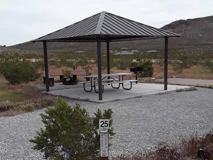 Standard campsite 25This site offers a shelter and a concrete slab with a table bbq grill and a nice fire pit with sitting area. Has a very large tent pad and plenty of parking area for the two vehicles or a Recreational vehicle and a car as well. Offers beautiful views 