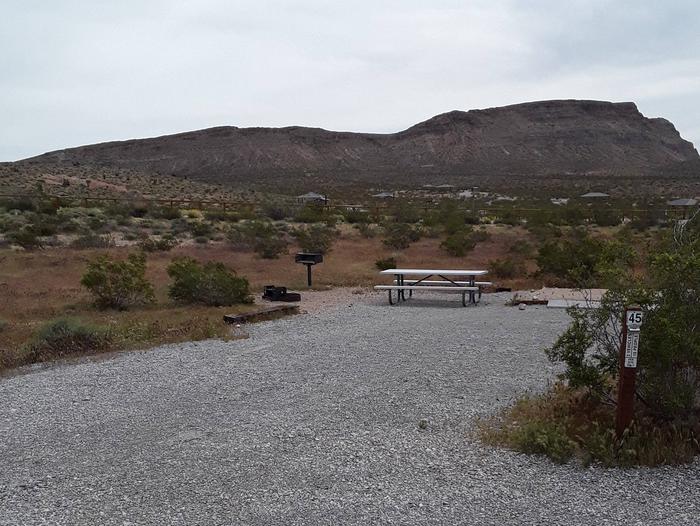 Red Rock Campground site 45 no shade structureThis site, #45, gives you a large long site that has a picnic table bbq grill and a fire pit 