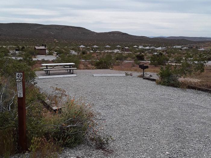 Red Rock Canyon Campground site 49  No shade shelter - Parallel parkingThis site includes a large tent pad a picnic table and a bbq grill and a fire pit to enjoy a campfire 
plenty of parking for the two vehicles allowed per reservation
No shade shelter 