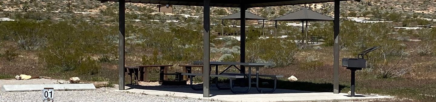 Red Rock Canyon Campground Standard site 1This site has a nice shade structure a large tent pad and a fire pit with sitting area. BBq grill and plenty of parking for the two vehicles allowed per reservation  check in with camphost for required vehicle pass