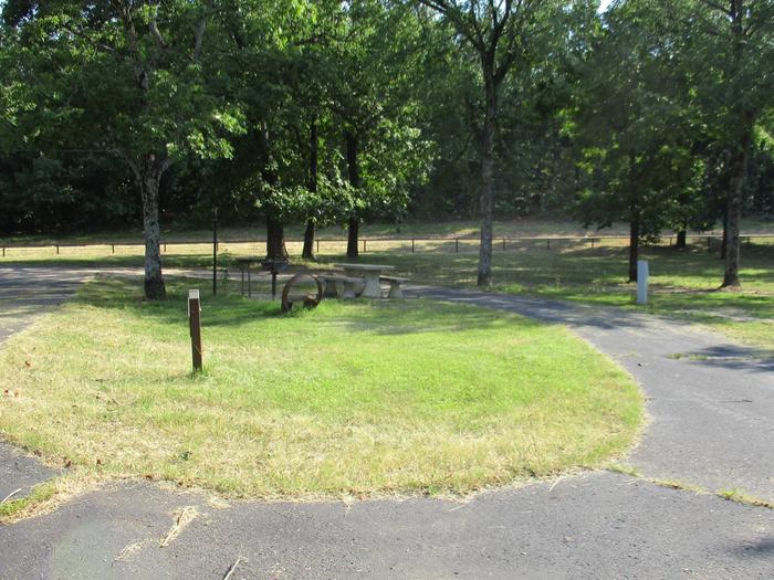 Site 8 offers a pull through drive.Site 8 is located directly next to the group day use shelter with easy access to the horseshoe pit and volleyball poles.