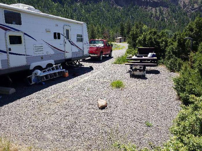 Rex Hale Campsite 5 - Back View gravel parking area, picnic table truck and RVRex Hale Campsite 5 - Back View