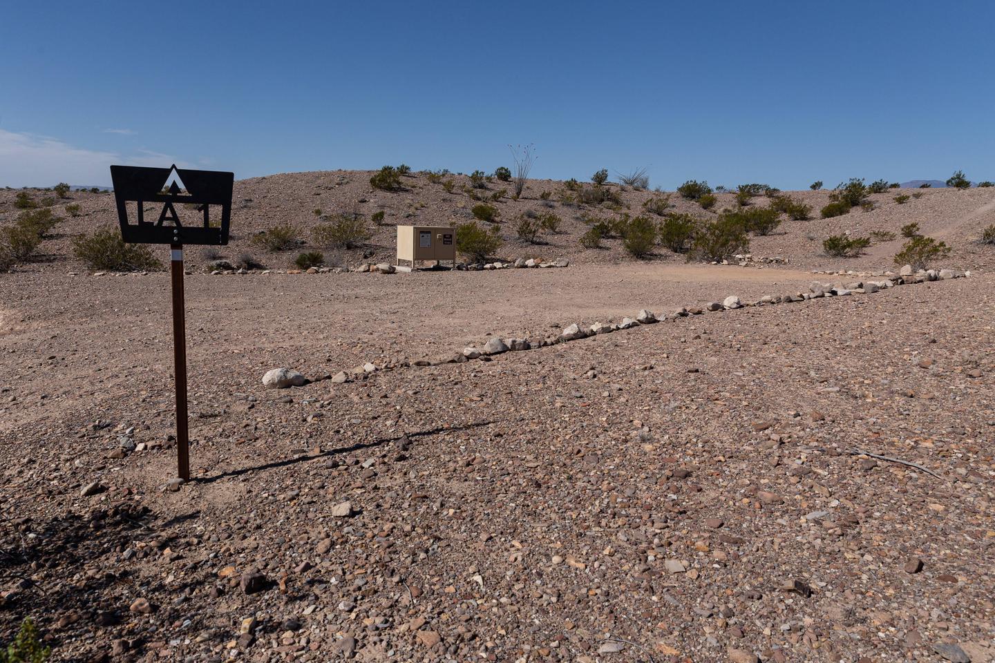 Campsite with close desert hills and bear boxCampsite marker and bear box