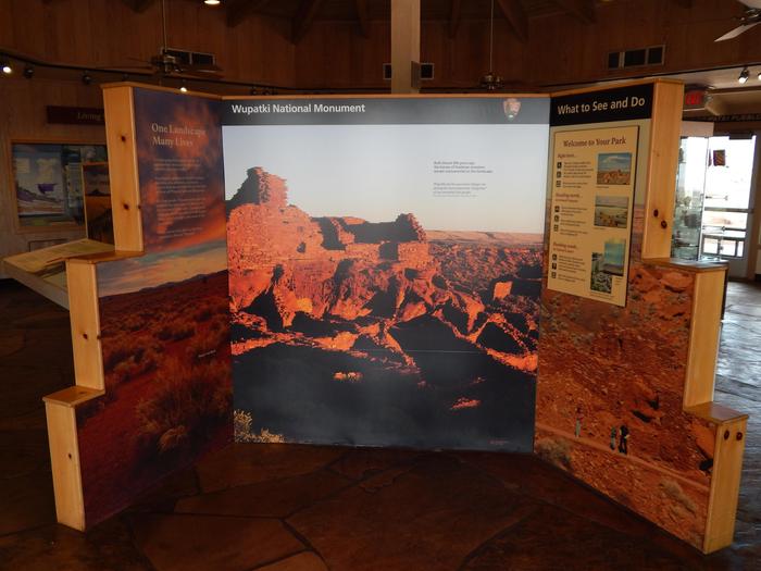 Front Entrance Interior ExhibitAs you enter the visitor center you can see a large image of the Wupatki Pueblo and read basic information about the monument.