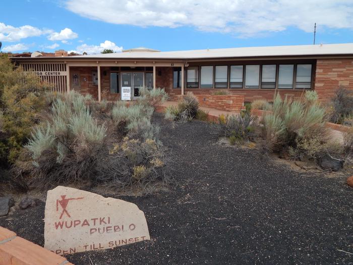 Side view of Wupatki Visitor CenterThe Wupatki Pueblo Trail is accessible from a path on the right side of the building.