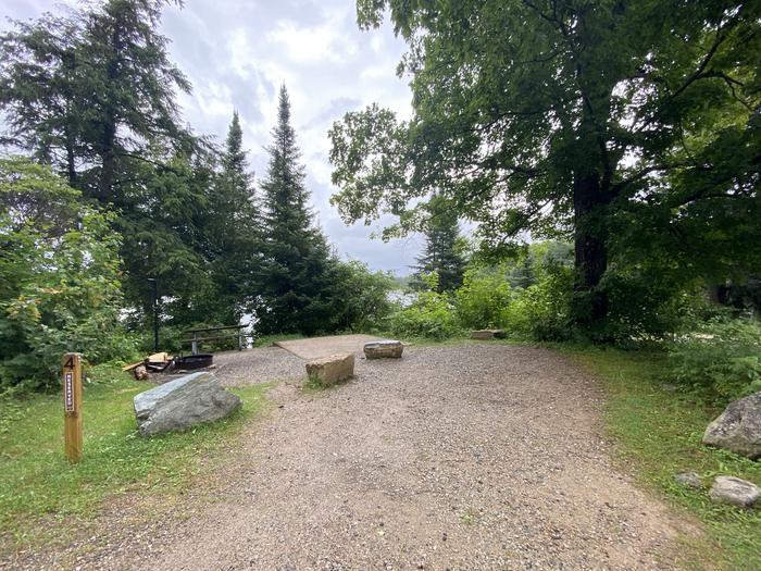 Pad, picnic table and fire ring with lake view