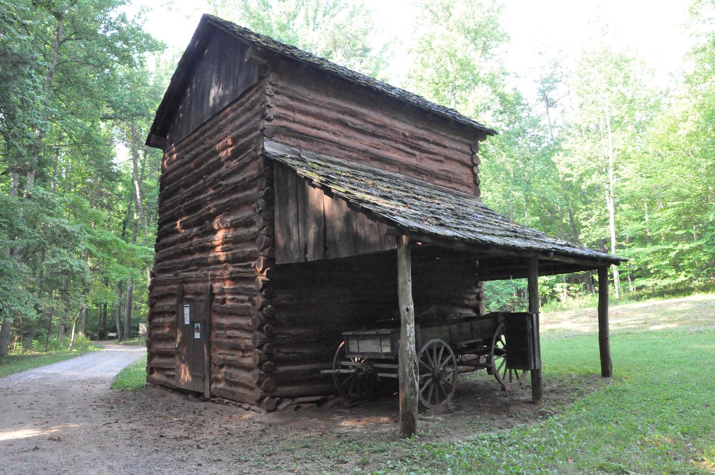 Tobacco barn with wagon
