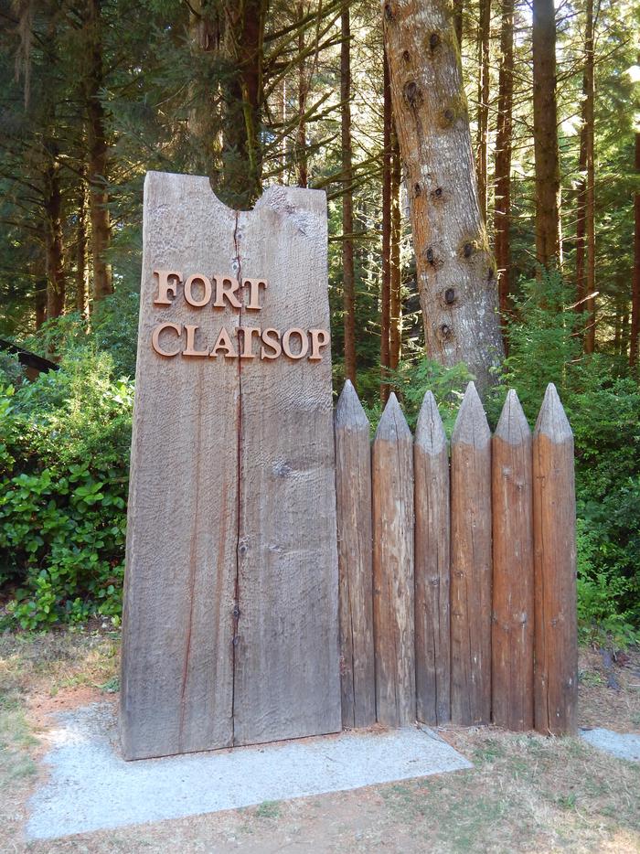 Fort Clatsop Visitor Center SignThe entrance sign at the Visitor Center was created in a style that reflects the actual Fort itself, wooden stakes and all.