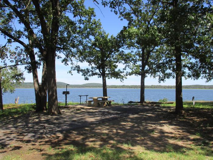 Site 20 - WildwoodSite 20 offers a fully shaded campsite with a great lake view.