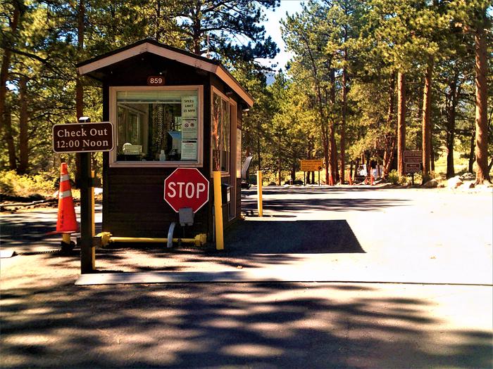 KioskDuring the summer, reservations are required to camp at Moraine Park Campground. All campers and visitors must stop at the kiosk where they will be provided with a car tag upon entry. The pass line may used to its right, but only for campers that have already checked-in and registered.