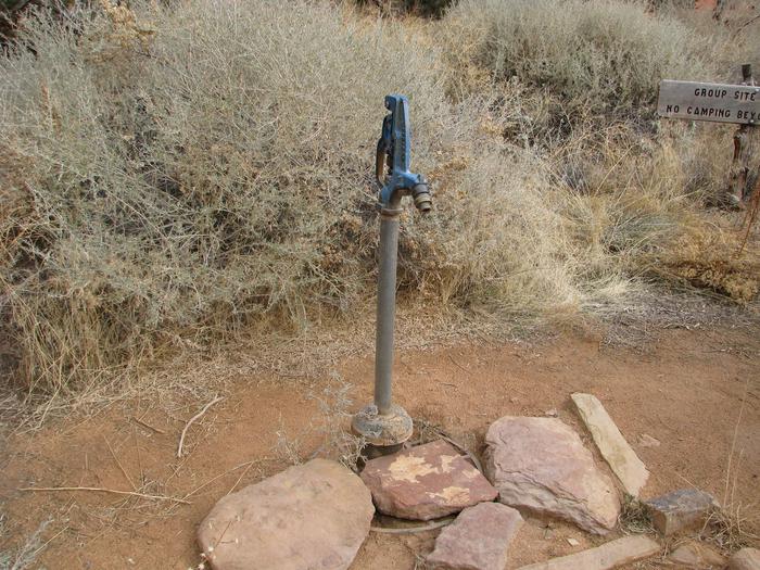 Spigot with potable water within the wooden shoe group site.