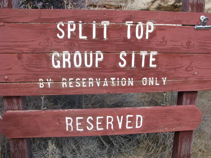 Split top group site sign.