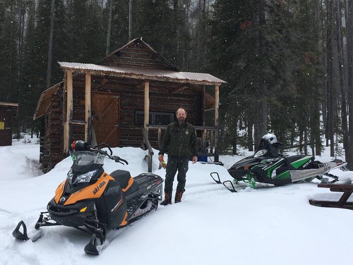 winter at racetrackwinter cabin check on snowmobiles