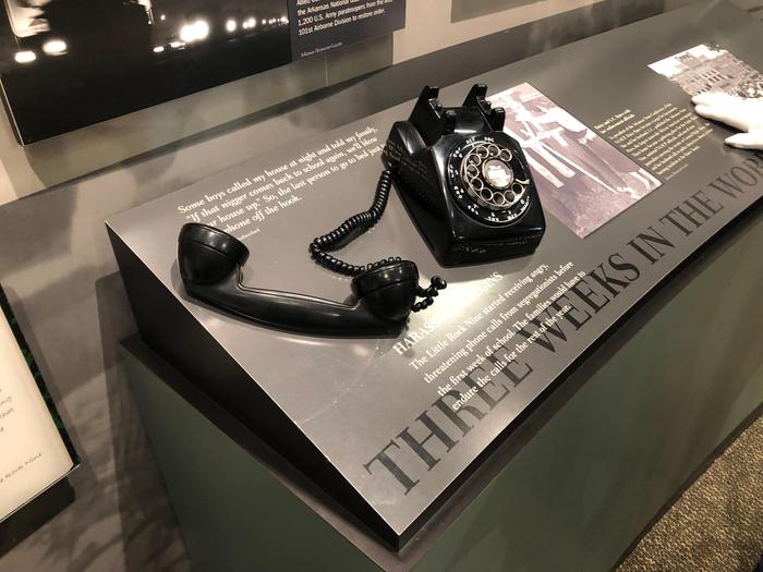 Visitor Center exhibitsa 1950s telephone sits on an exhibit entitled "Three Weeks in the World"