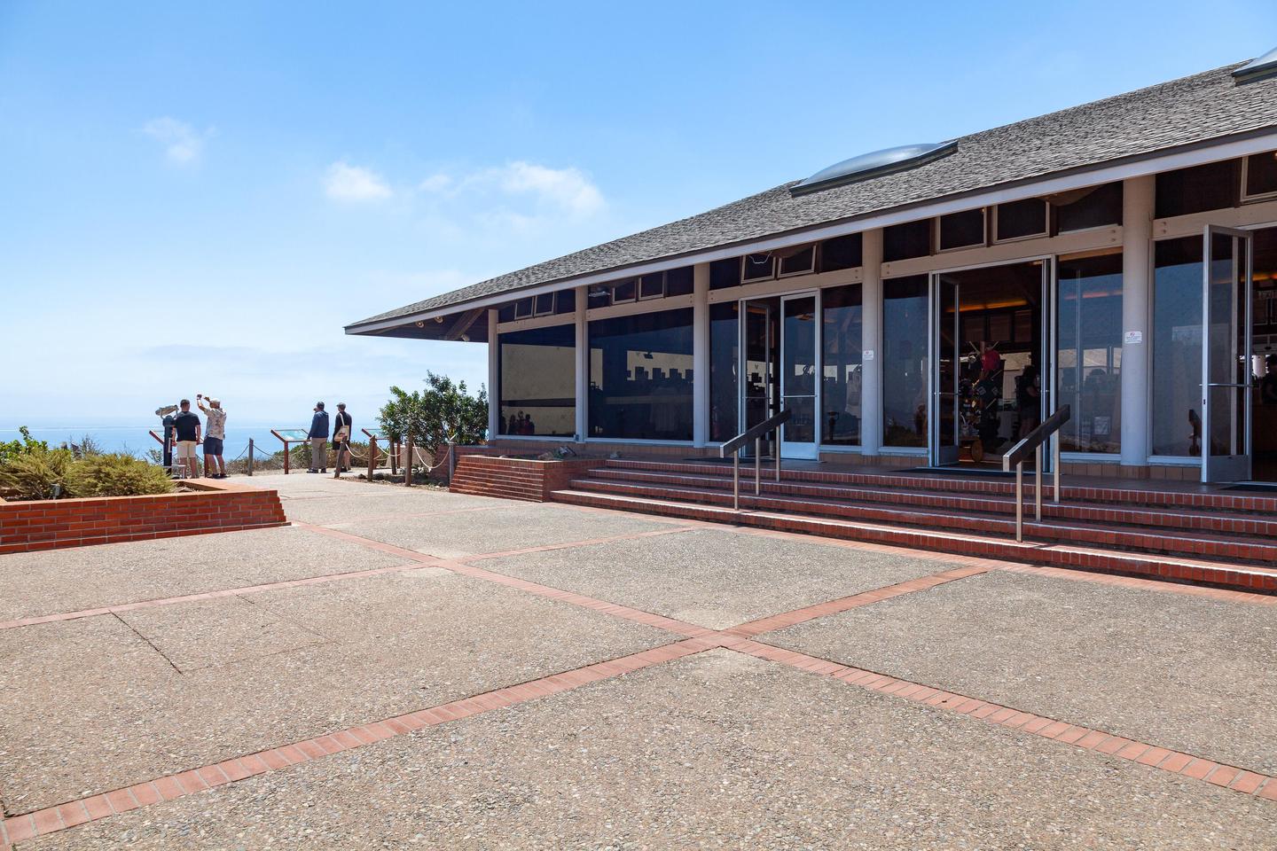 Back entrance to the View Building.The patio at the rear of the View Building. Telescopes are present as well as a view of Ballast Point from this spot.