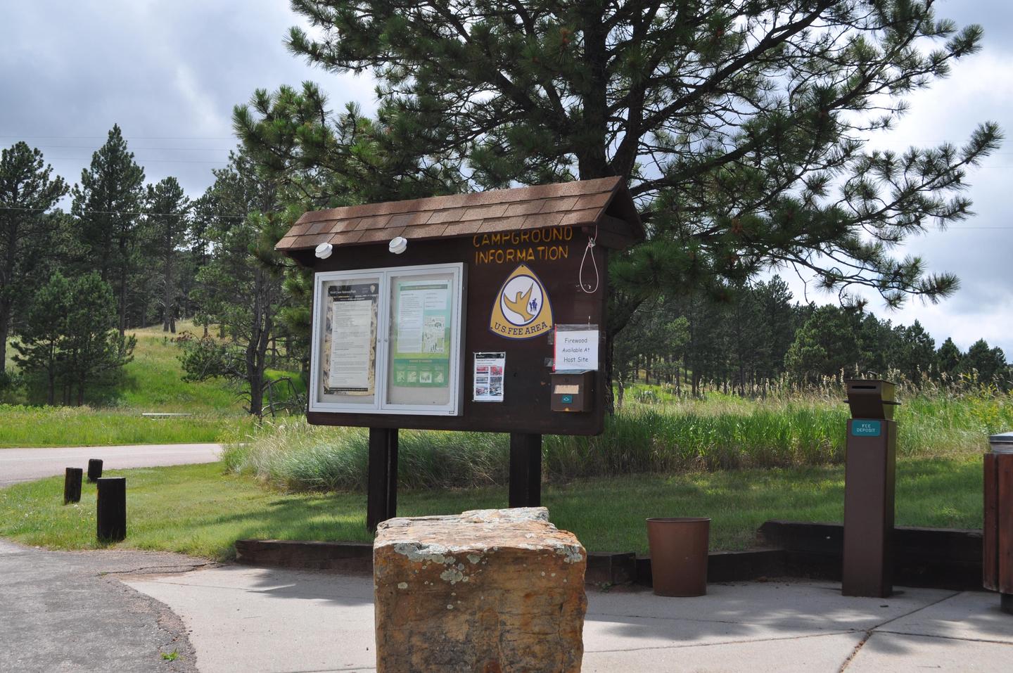 Elk Mountain Campground Registration BoardThe Elk Mountain Campground is a first-come, first-served site. Campers can register the campsite of their choice the day of their stay, and drop their cash payment in the drop box.