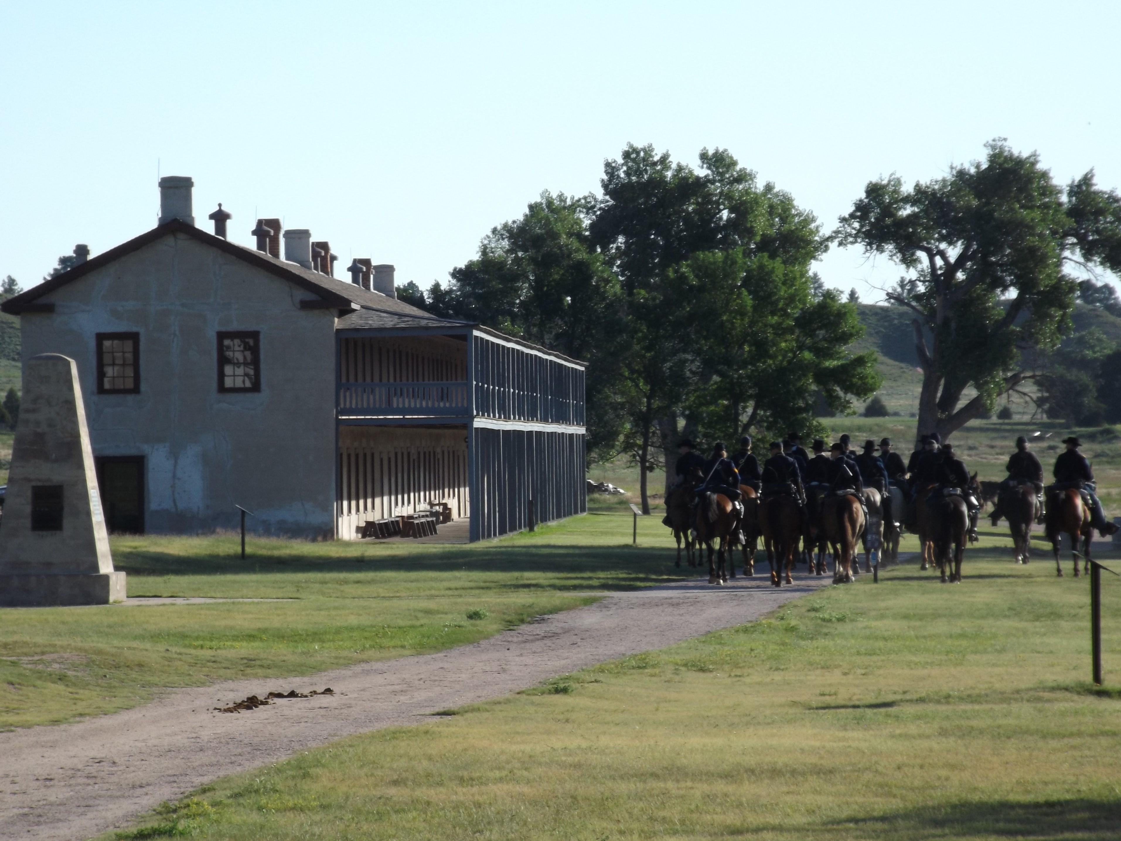 11th Kansas Ride Past the Cavalry Barracks