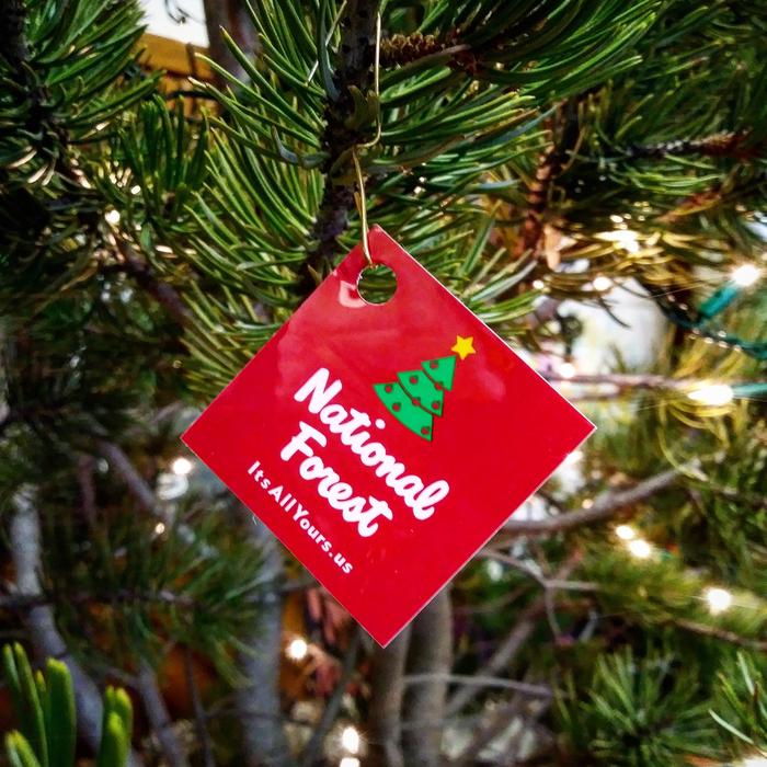 It's All Yours sticker as an ornament on Christmas TreeIt's All Yours 