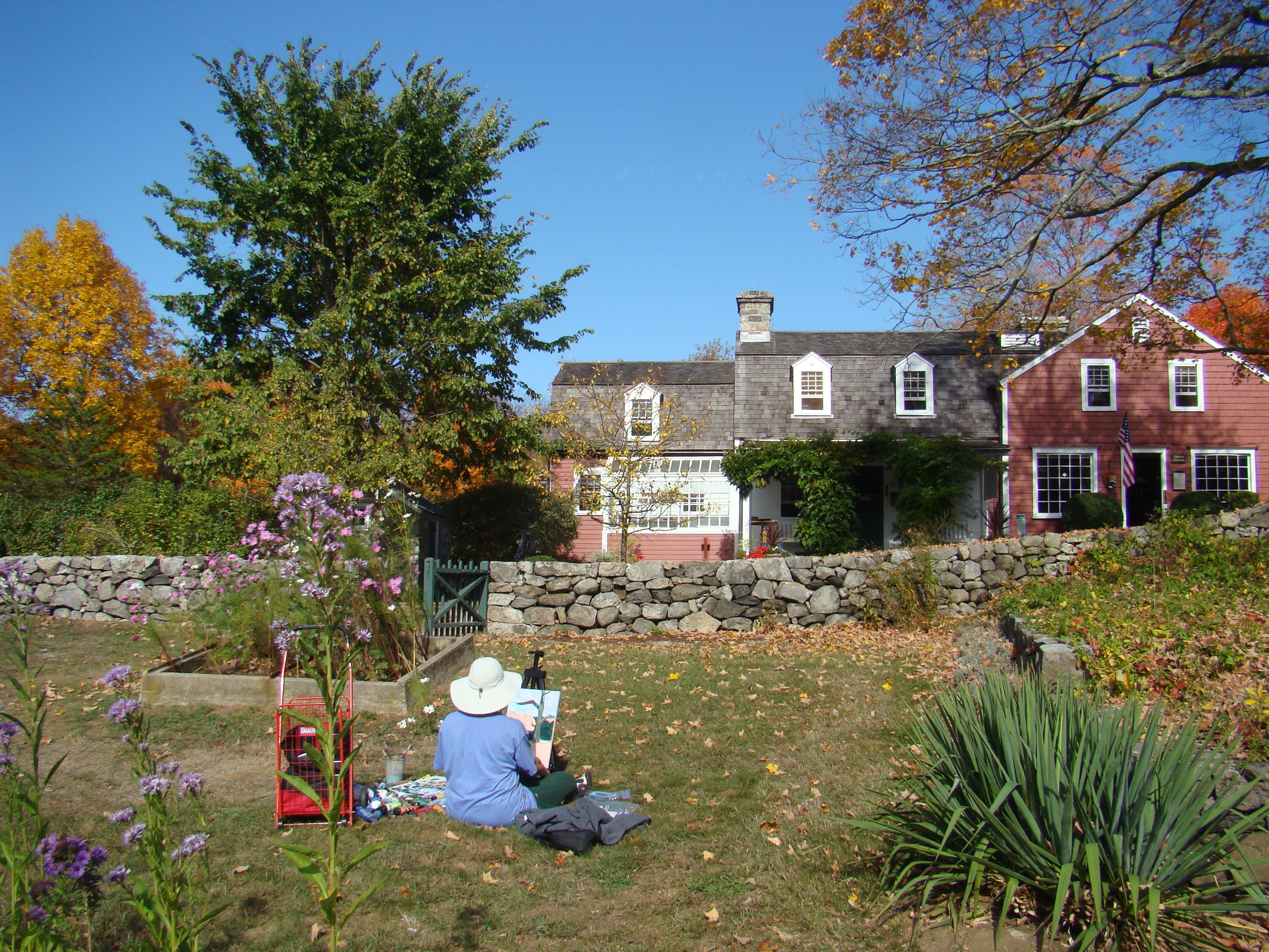Artist Painting the Burlingham House Visitor Center