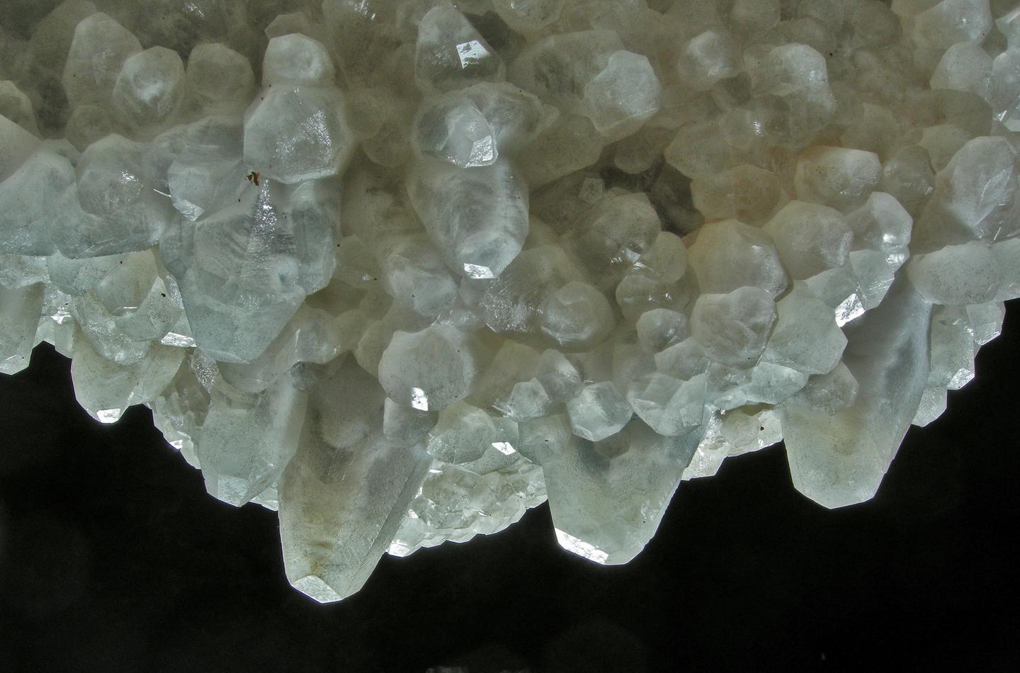 Nailhead SparCalcite crystals, such as nailhead spar, cover most of the walls, ceilings, and floors within Jewel Cave.