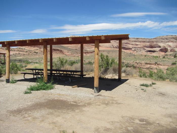 Large shade shelter with picnic tables underneath, at Dewey Bridge Group Site A.Image of large shade shelter with picnic tables underneath, at Dewey Bridge Group Site A.