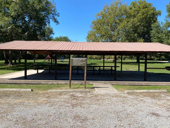 Group ShelterThis Shelter/Pavilion area is the perfect spot to get out of the elements and still enjoy a peaceful gathering. This area does have electric and is equipped with several power outlets, picnic tables and grills to be used. 