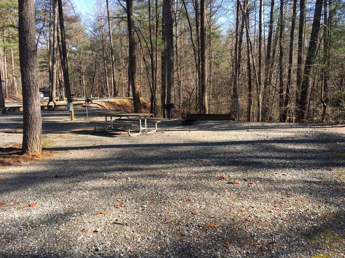 Gravel site with fire pit, table, grill Gravel site with fire pit, table, grill