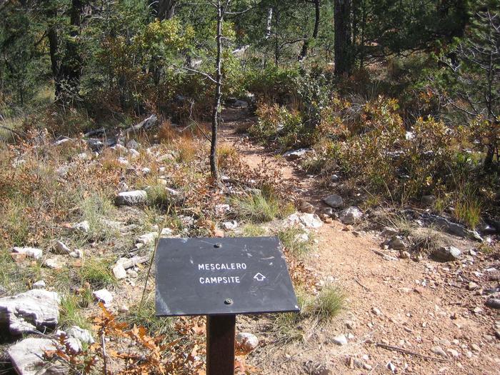 Mescalero Wilderness CampgroundA sign directs hikers off the trail to the Mescalero campsites