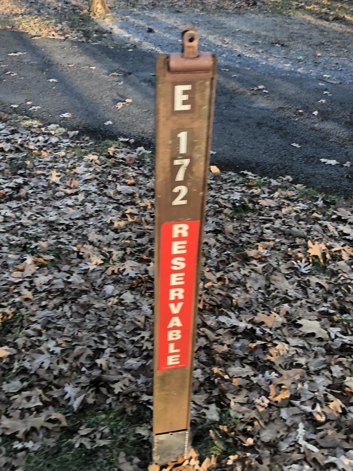 E172 Site Marker: If you reserve this site, your camping pass will be attached to this marker.  When you check out drop your camping pass at the registration office.