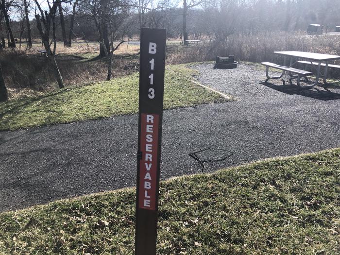 Site marker for B113; If you reserve this site, your camping pass will be attached to this site marker.  When you check out, drop your pass off at the registration office. 